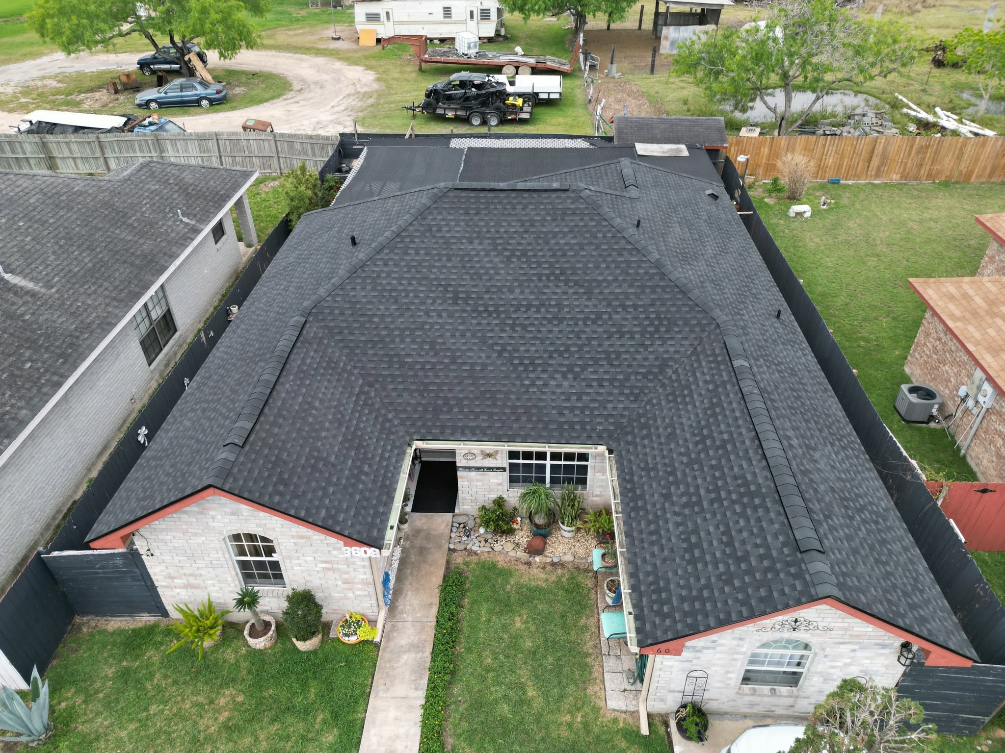 Completed Charcoal shingle roof on a home in Brownsville, Texas